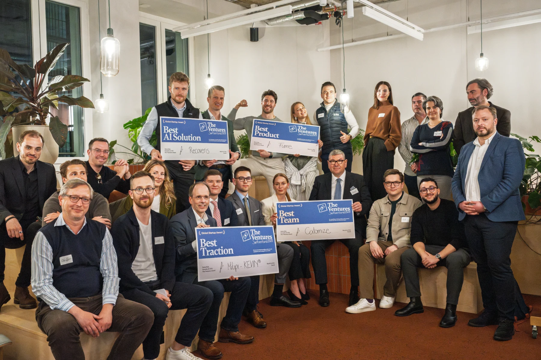 Group photograph with the four award certificates at The Ventures Switzerland 2026